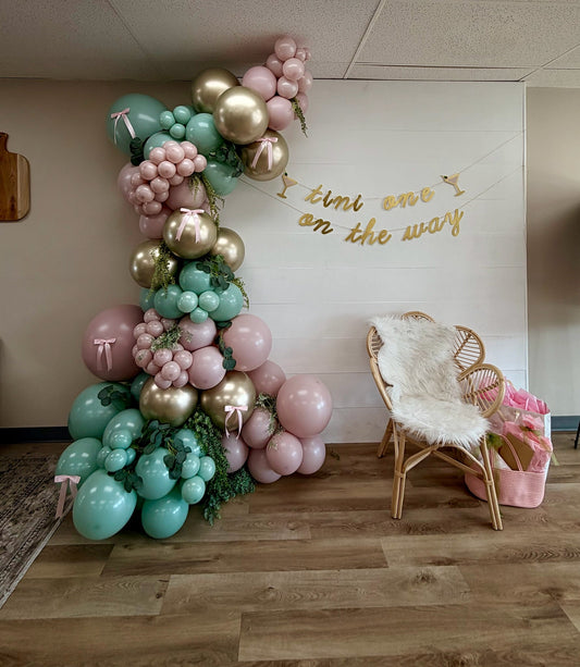 Free-standing sage, blush and gold balloon garland by Air with a Flair