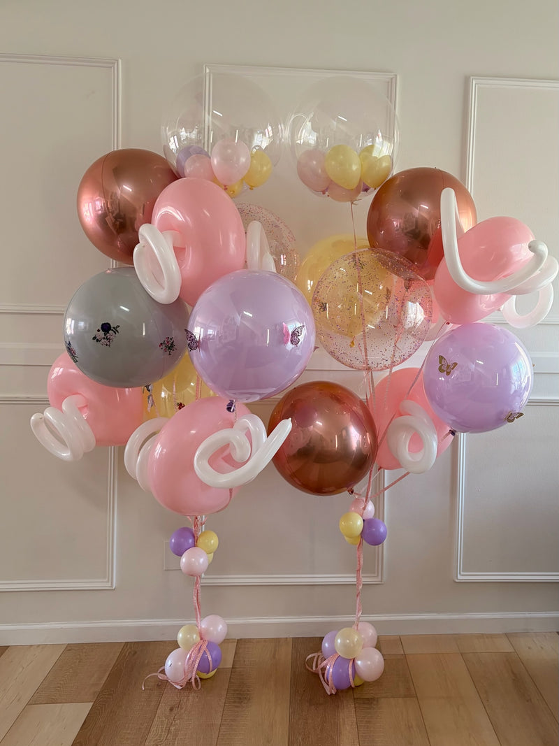 Rose gold and blush helium bouquet with bubble balloons