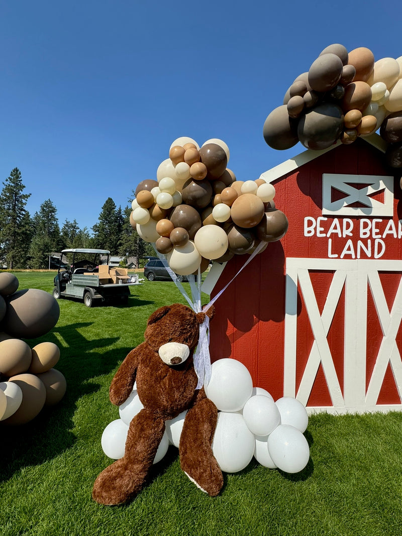 Bear Bear Land barn backdrop with brown organic balloon garland