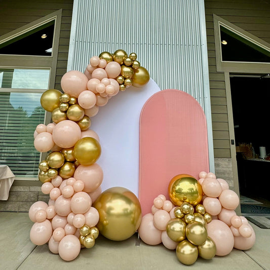 Blush, cream and gold organic balloon arch with backdrop panels by Air with a Flair