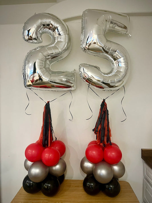 Balloon-filled number towers by Air with a Flair